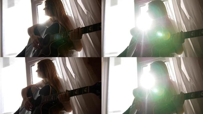 年轻少女在家弹原声吉他，特写