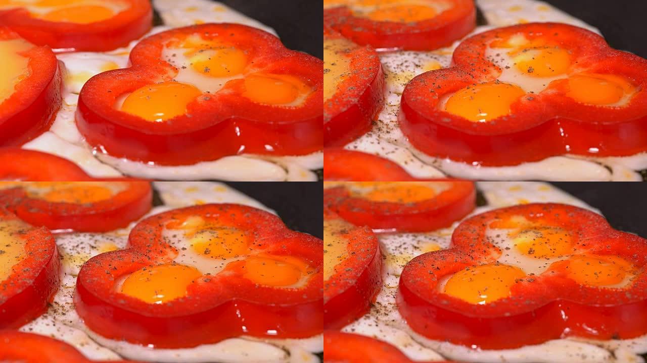放在辣椒中的鸡蛋在平底锅中油炸