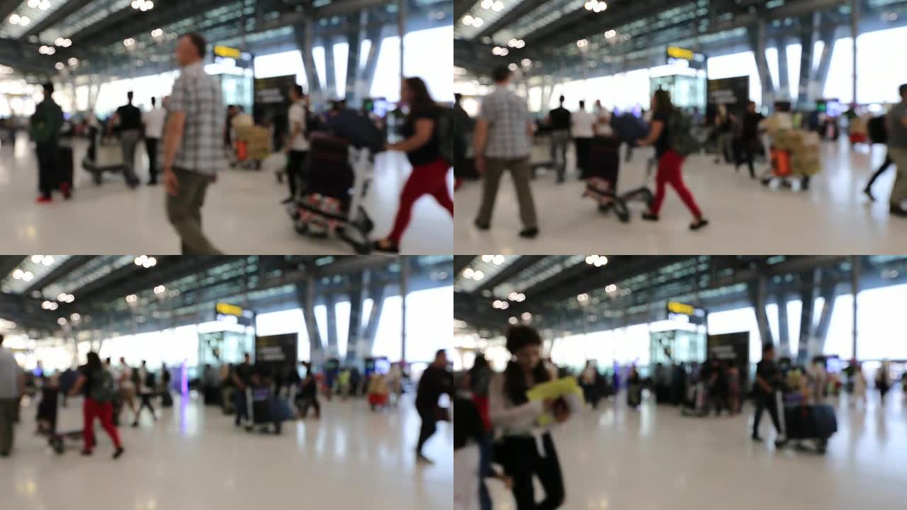 摘要模糊了通勤人群和乘客在机场航站楼行走的视线，模糊了繁忙的机场航站楼镜头的概念。