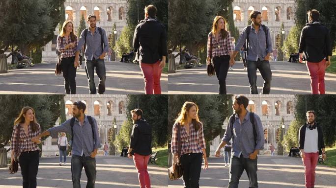 年轻幸福的夫妇走在公园路上，树木和迷人的年轻人瞥了一眼罗马背景下的女朋友格洛西斗兽场日落时可爱的长发