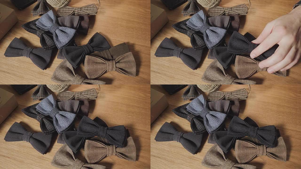特写镜头中很多现成的羊毛制成的蝴蝶领结，增加了成品。