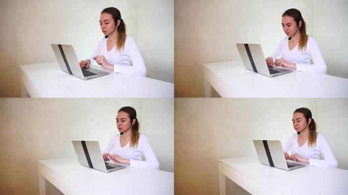 年轻女子使用笔记本电脑接受人力资源经理的采访