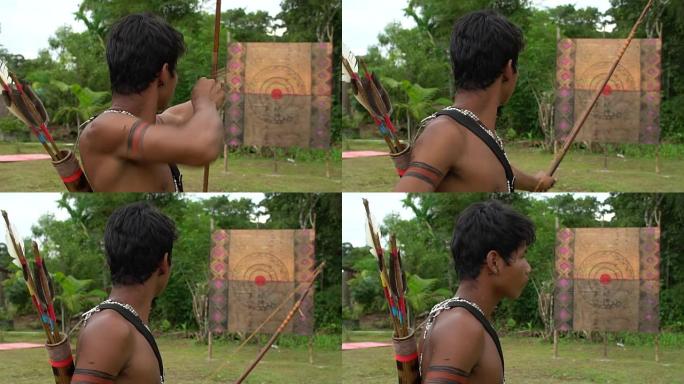 在巴西玩弓箭的图皮瓜拉尼部落的土著人
