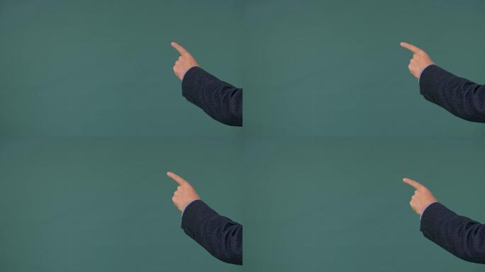 左男性手触摸或在绿色背景上滑动。手势手指和手。指针手指。