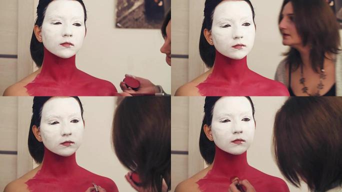 化妆师在模特脖子上的绘画