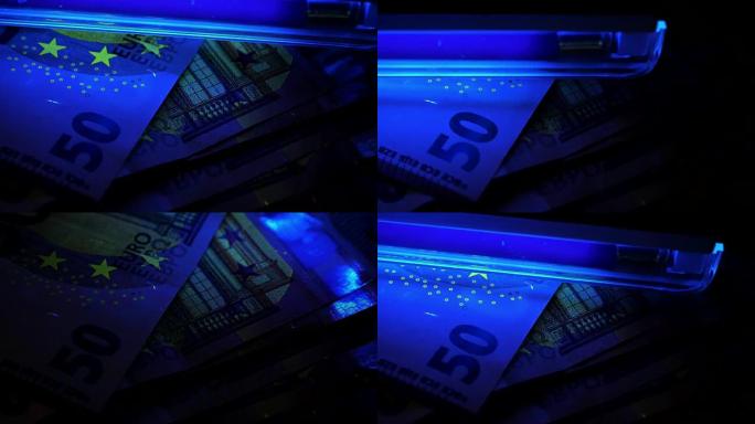 紫外线下的欧元。检测假钞。