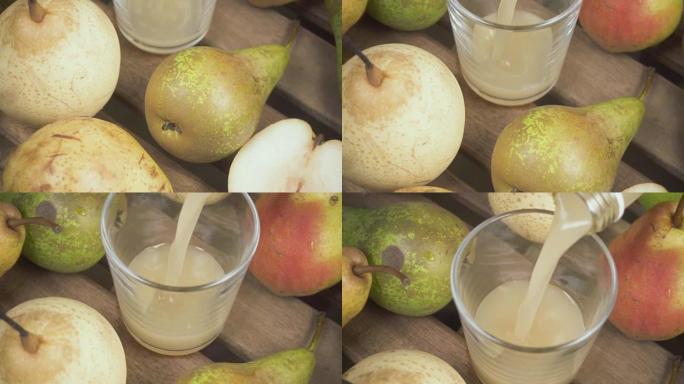 半个梨和果汁倒入玻璃慢动作