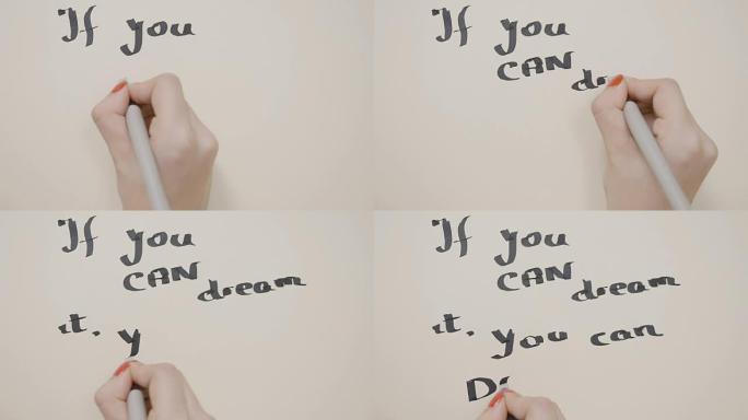 年轻的少女手写励志名言如果你能梦想它你可以用黑笔在白纸上用大写字母