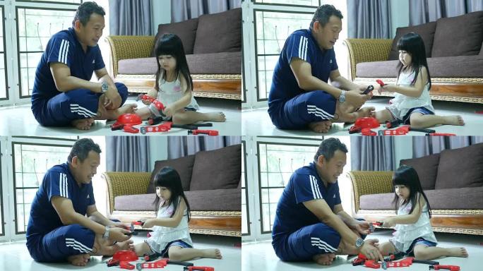 快乐的父亲和女儿一起玩