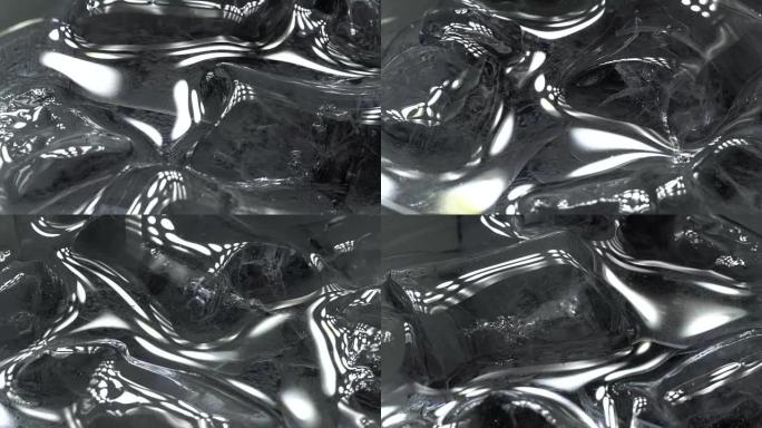 Glass of water with ice in rotation