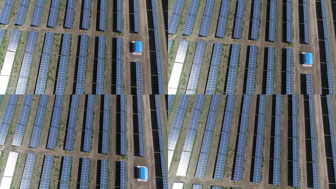 太阳能发电厂的全景，成排的太阳能电池板，太阳能电池板，俯视图，太阳能发电厂的鸟瞰图，可再生资源主题的