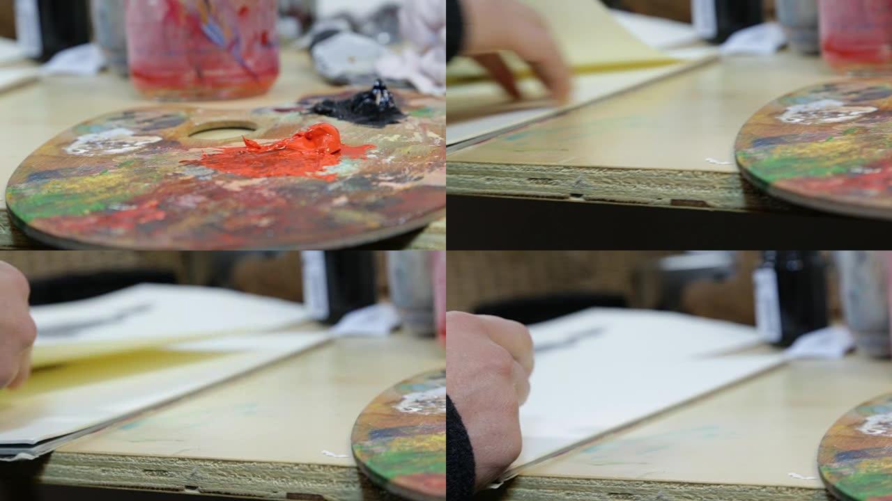 艺术家绘画 -- 在画家的工作室里，用颜色观看调色板