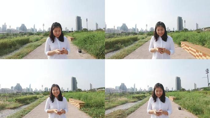 An Asian woman in public park.