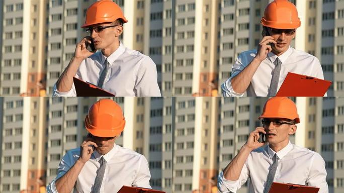 工程师在智能手机上讲话