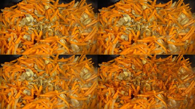 用洋葱和胡萝卜制备香菇。铸铁锅。