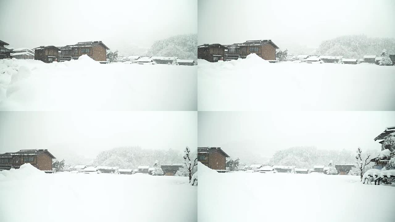 平移: 雪strom覆盖了Shirakawago村