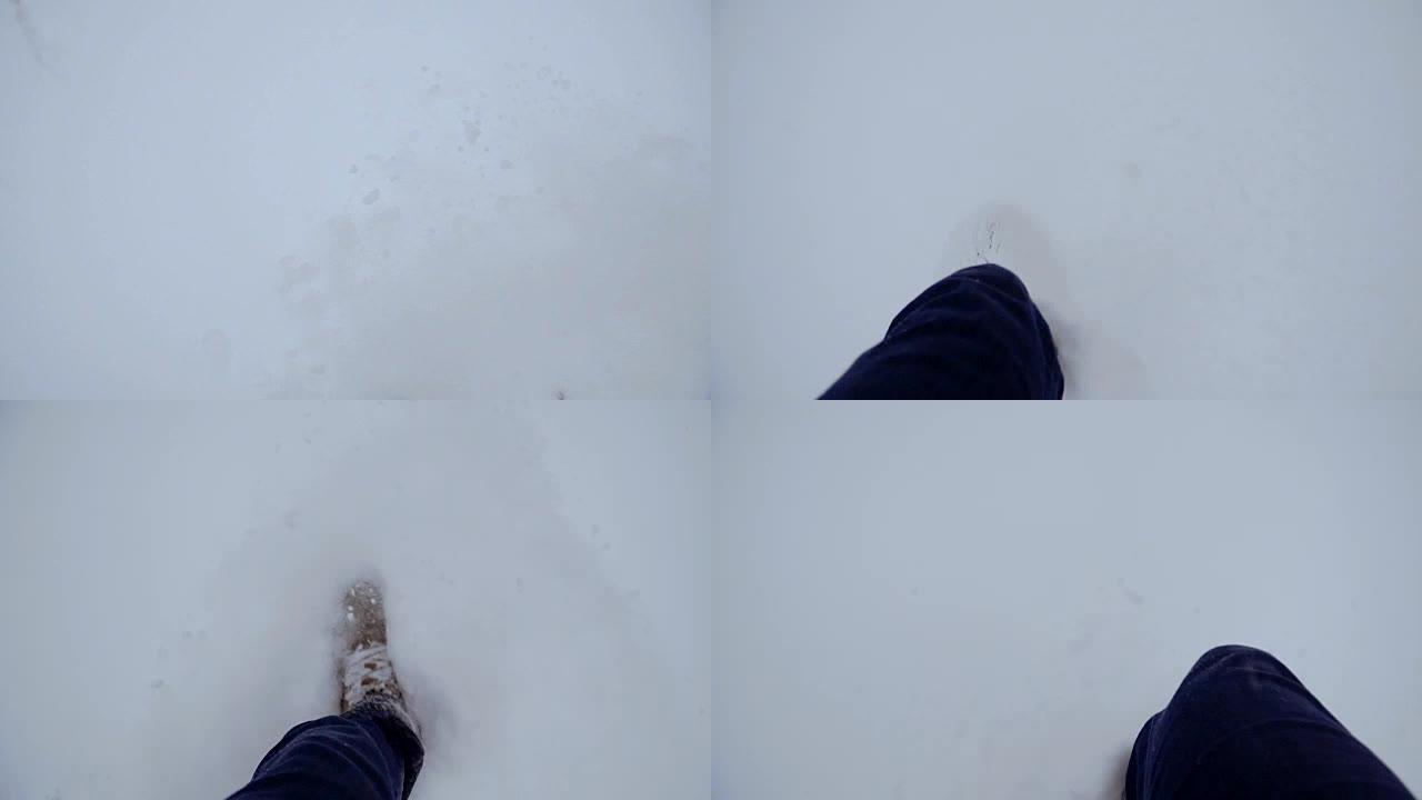 冬天。腿在雪地里行走