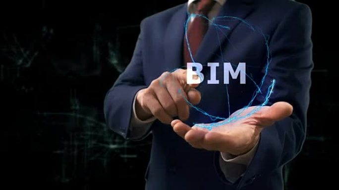 商人在手上展示概念全息图BIM