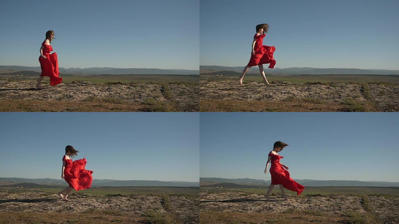 一个穿着随风飘扬的衣服的女人沿着悬崖的边缘奔跑
