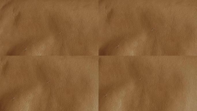 天然棕色皮革纹理背景。抽象复古牛皮背景设计。
