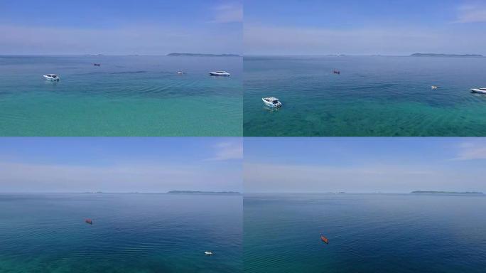 大风天在公海航行的游艇的壮丽景色。无人机视图-鸟瞰角度，小天堂岛，泰国。泰国安达曼海Koh Lipe