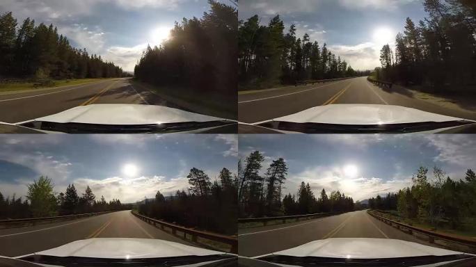 在4k驾驶大提顿山脉森林的视点。从杰克逊霍尔到提顿国家公园和美国怀俄明州黄石国家公园的高速公路