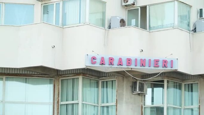 The white Carabinieri apartment building in Messin