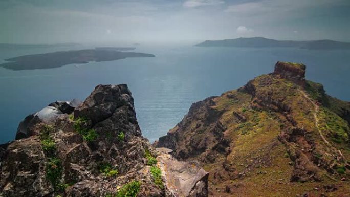 晴天著名的圣托里尼岛斯卡罗斯岩石路全景4k时间流逝希腊