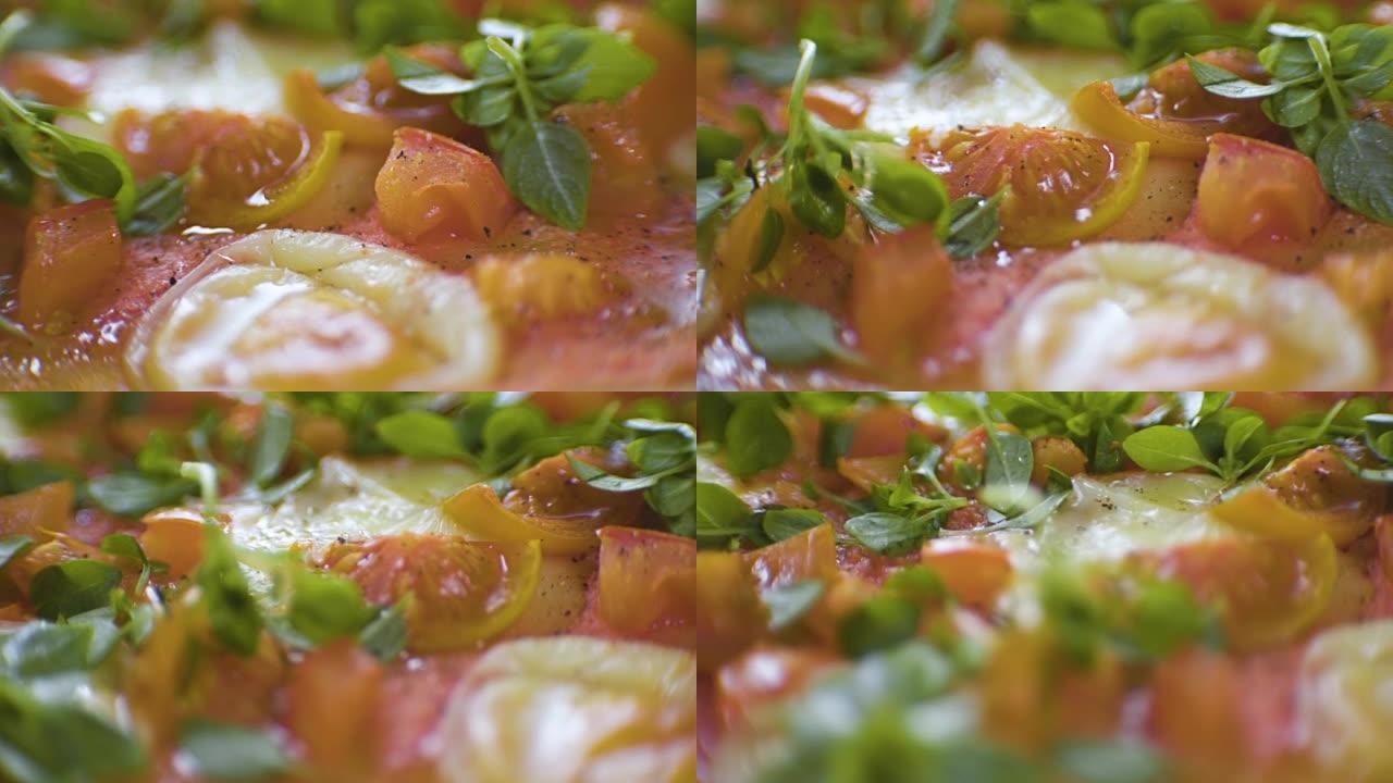 融化的奶酪、西红柿和罗勒特写。视频