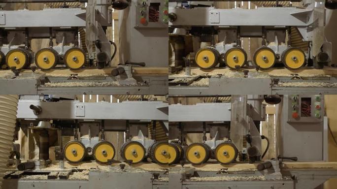 锯木厂生产中的木板磨浆机的运行轮