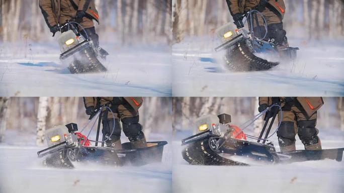 迷你雪地摩托克服、操纵和转向深雪