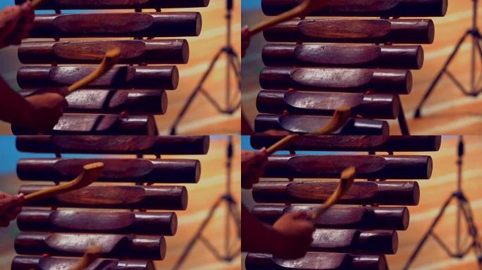 近距离击打或打pong lang或来自泰国东北部Isan地区的原木木琴。