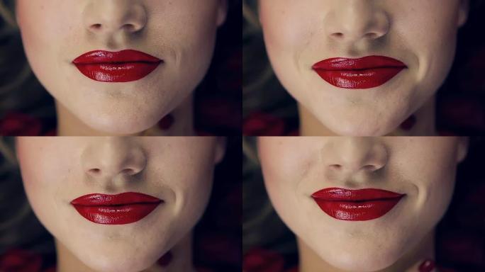 一个女孩嘴唇上有红色唇膏的特写镜头。