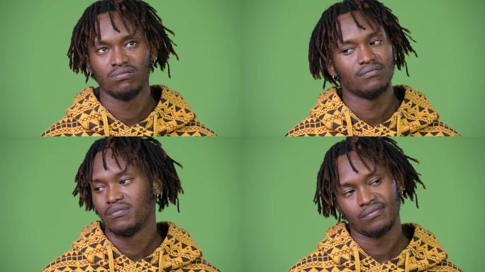 年轻英俊的非洲男人看起来很无聊