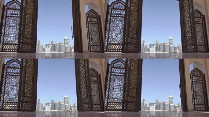 多哈摩天大楼穿过清真寺的敞开大门