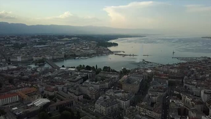 瑞士日落时间日内瓦城市景观湖滨湾空中全景4k