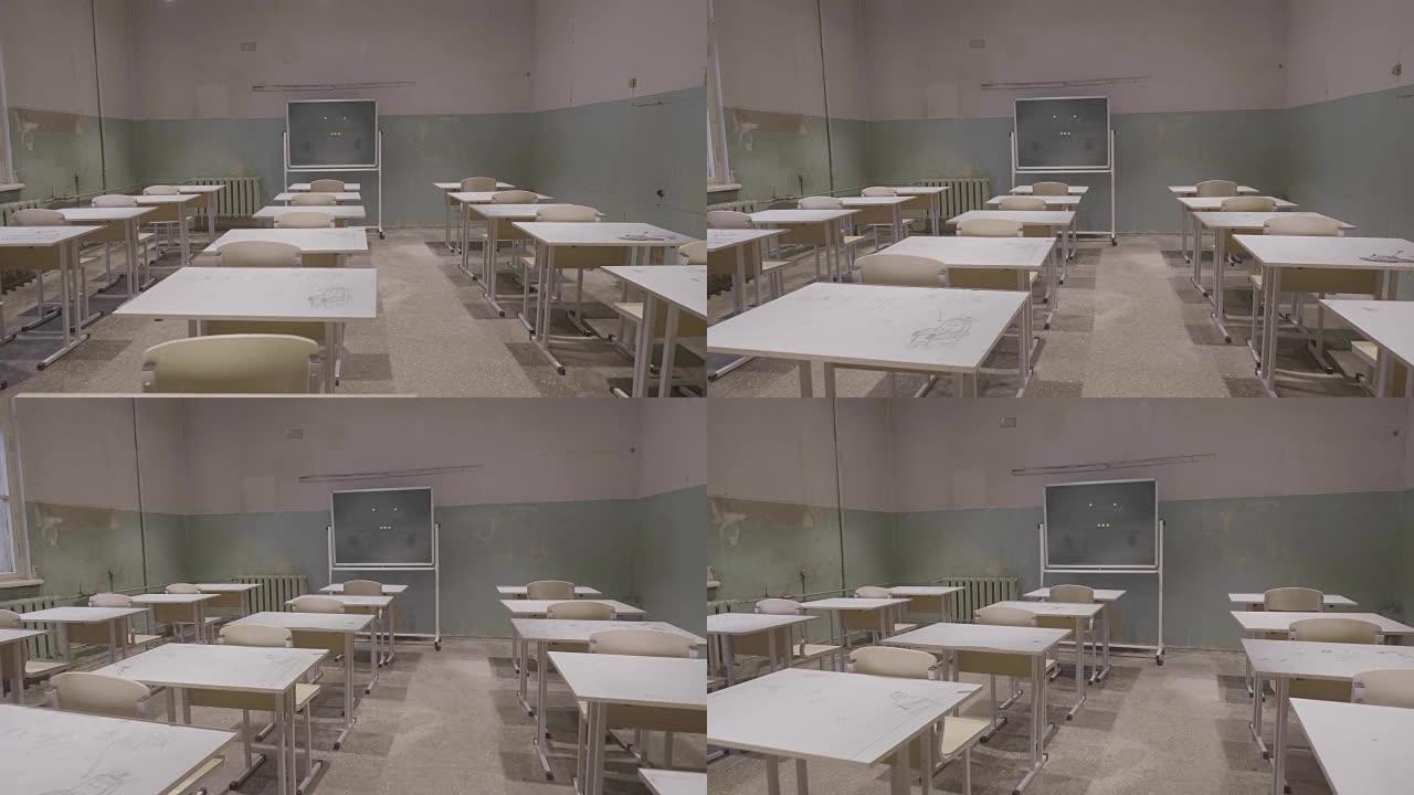 空教室，学校里有木制书桌，白色和绿色的粉笔板。空教室。废弃的学校教室，配有课桌和黑板