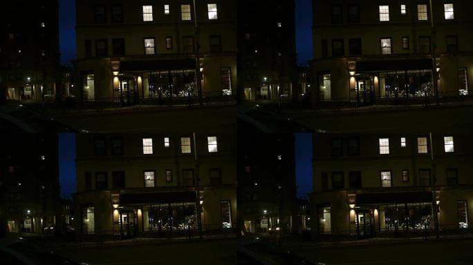 一个外景拍摄的普通的小企业在夜晚的城市