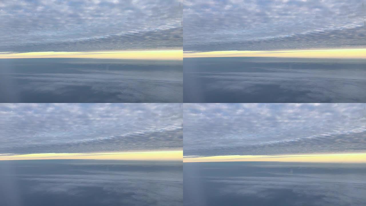 View sunset with sky and cloudy from airplane wind