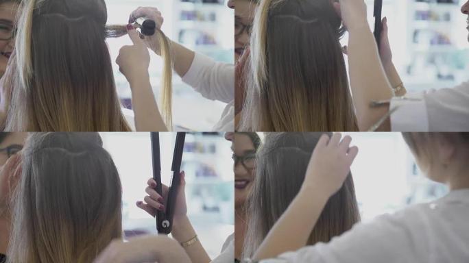 女美发师在美容院用卷发器拉直淑女头发
