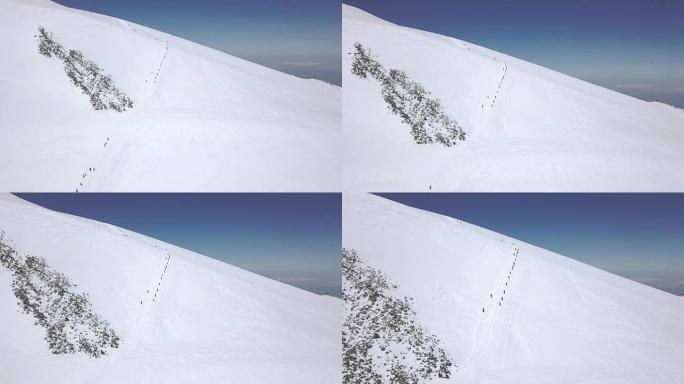 雪山谷的极限旅游鸟瞰图。冬季徒步登山