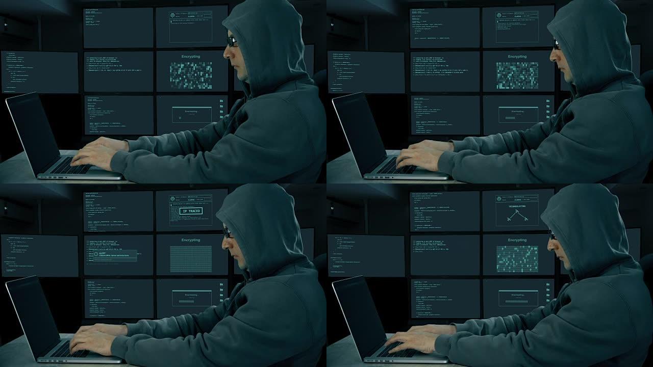 黑客在笔记本电脑上打字。黑夜里，人在电脑上编码。戴墨镜的男人在键盘上打字。侧面形象。监控的房间。
