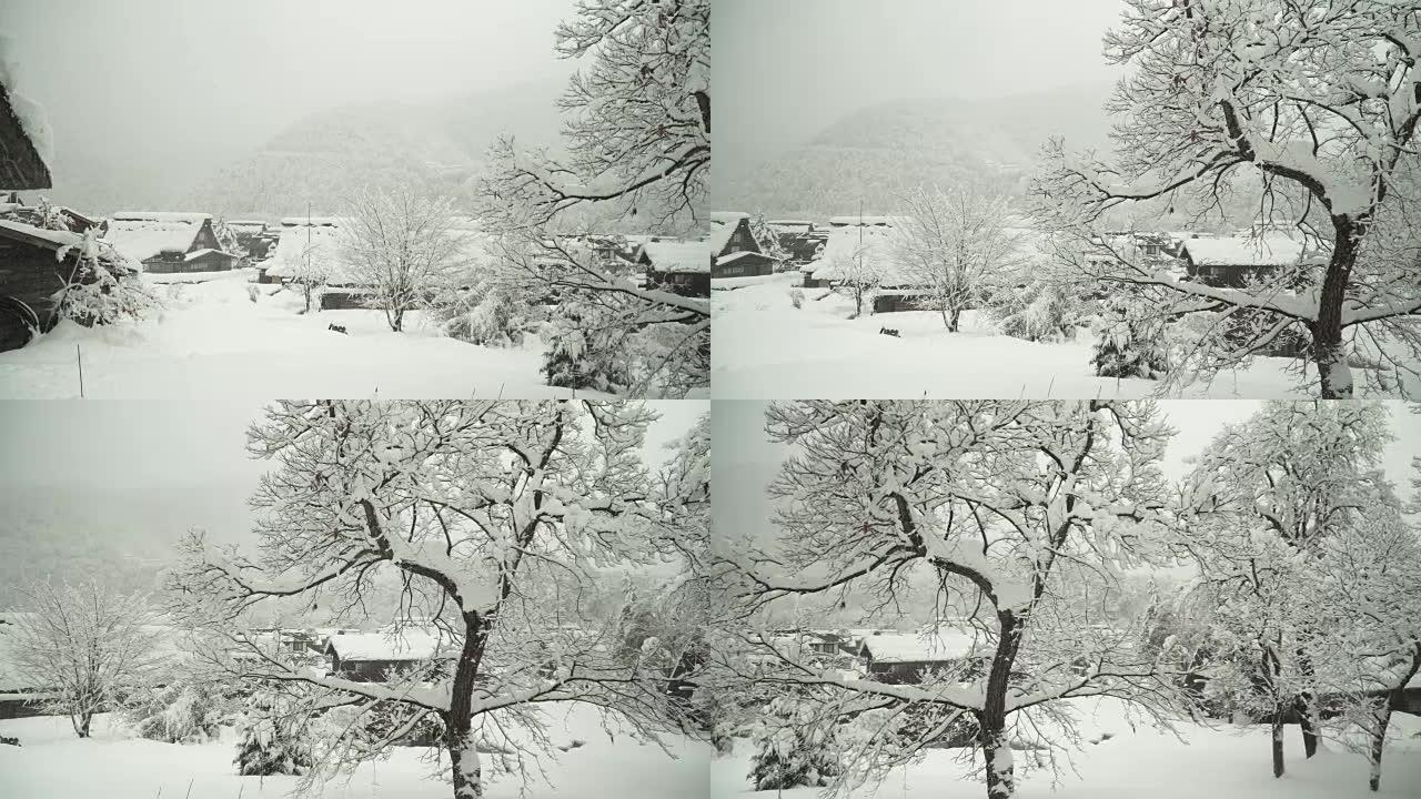 高角度视野平移: 雪strom覆盖了Shirakawago村