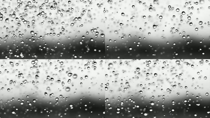 雨滴视频背景。慢动作液滴动画。循环。