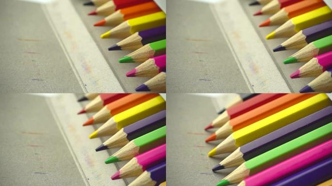 彩色铅笔以慢动作从包装中滑出