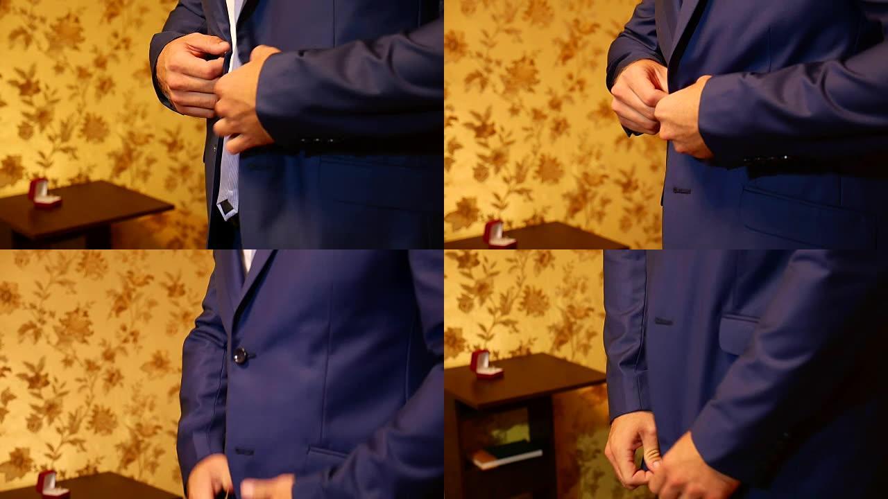 商人校正夹克上的纽扣，手特写，穿衣，男人的风格，校正袖子，为婚礼做准备
