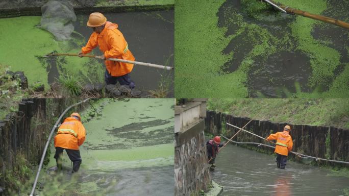 下雨天工人清理河道水草