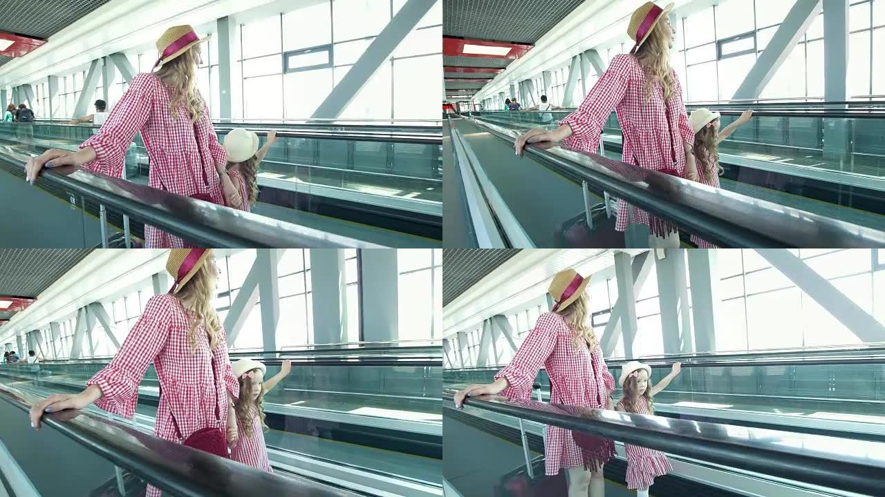年轻有魅力的女性旅行者在机场的自动扶梯上崛起