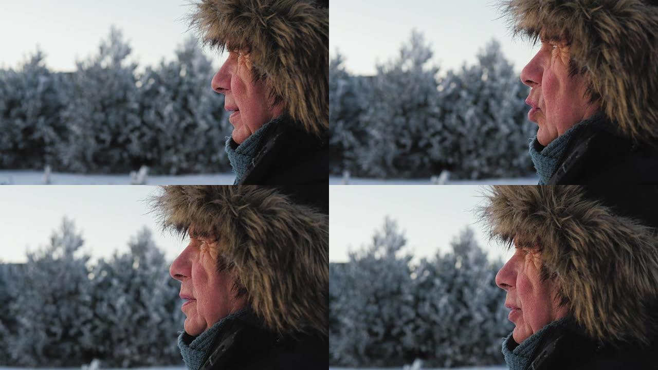 肖像侧视图冬季夹克和皮帽有皱纹的老人