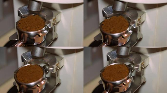 研磨咖啡从咖啡研磨机到portafilter